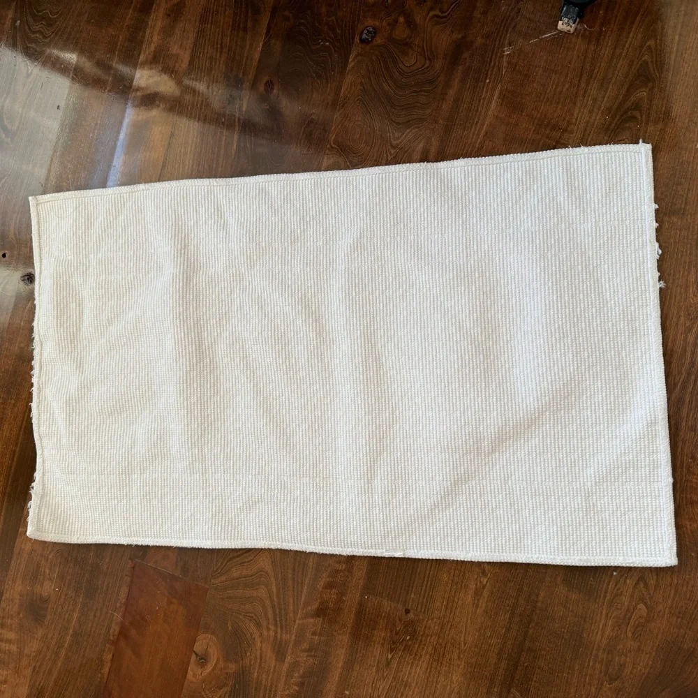 Bright white rug 34 by 20 does have some light fray on edges.